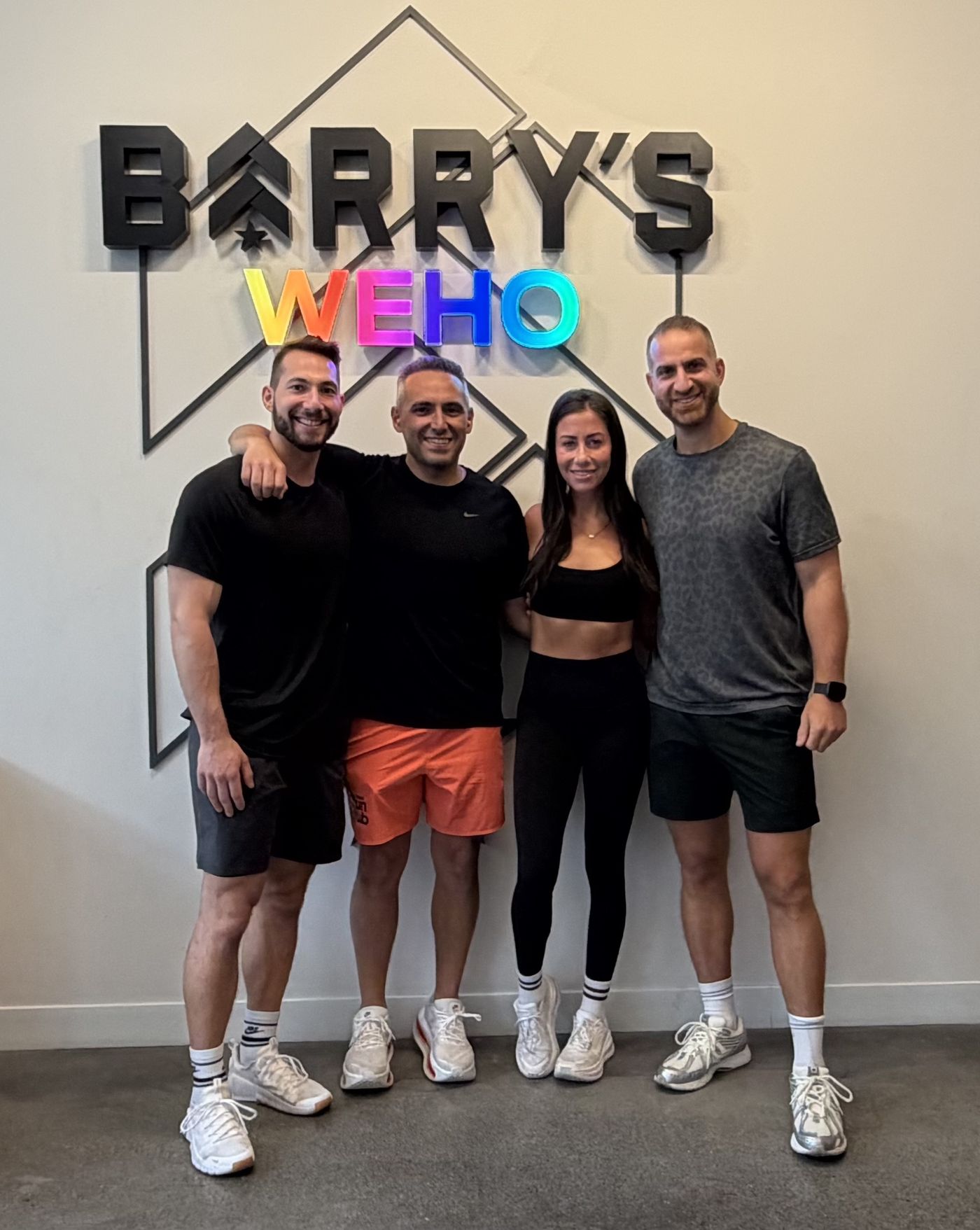 Nate with clients and friends at Barry's WeHo